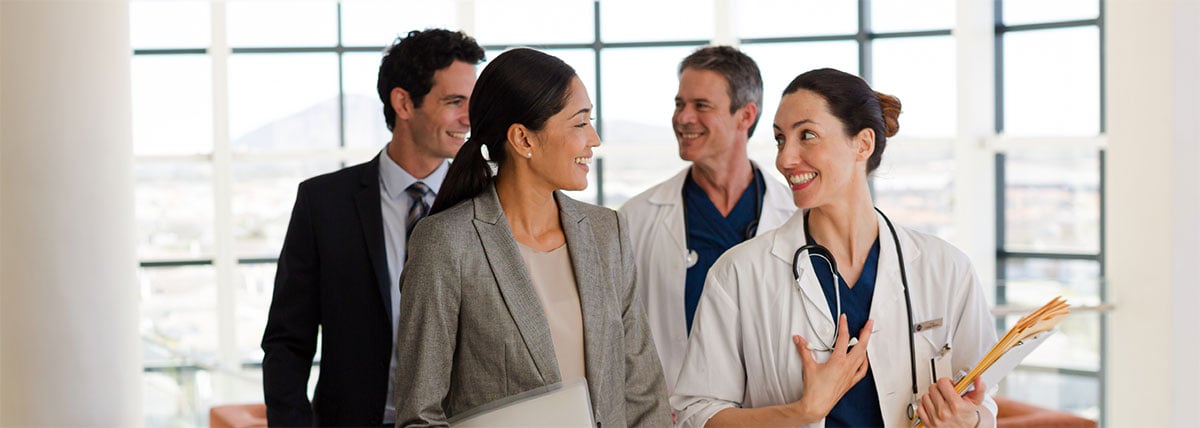 doctors and consultants talking in a hospital