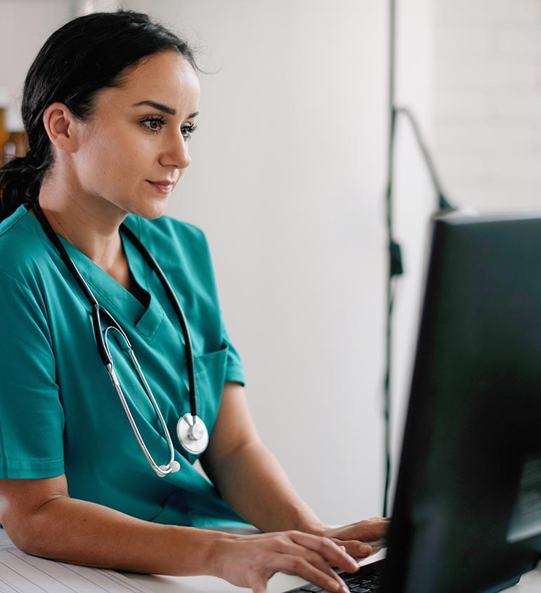 nurse on computer